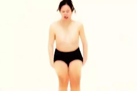 AI Video from prompt: A woman, her energy palpable as she straddles a 
