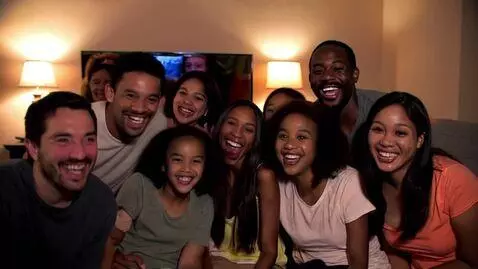 AI Video from prompt: 1980's VHS  family  home video everyone has a hu