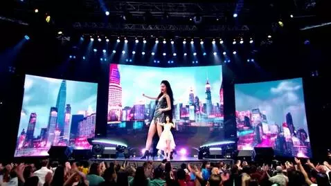AI Video from prompt: Shakira AI dancing ok stage with her fans