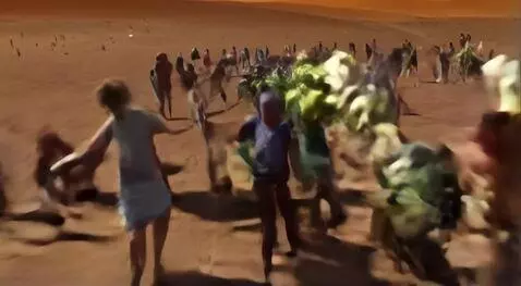 AI Video from prompt: chaotic scene featuring people running in terror