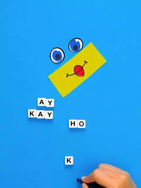 AI Video from prompt: A blue screen with black ink, A Hand Spawns Yell