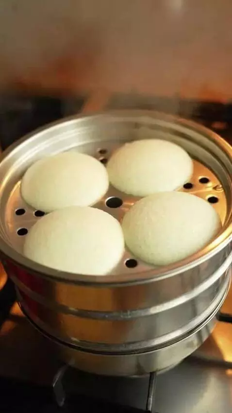 AI Video from prompt: She's an Indian girl cooking with the traditiona