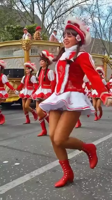 AI Video from prompt: The girl is dancing the jive and walking past us
