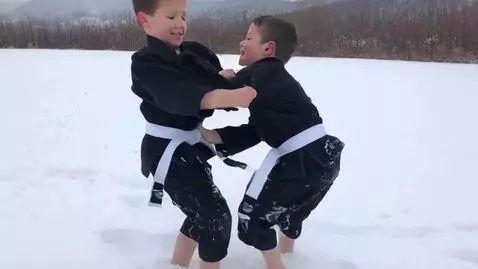 AI Video from prompt: two boys at six years,wearing black bjj jackets,