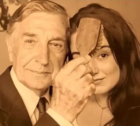 AI Video from prompt: He brushes her hair gently with a brush.