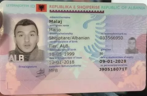 AI Video from prompt: ake this man in id hold his id behind him and a 