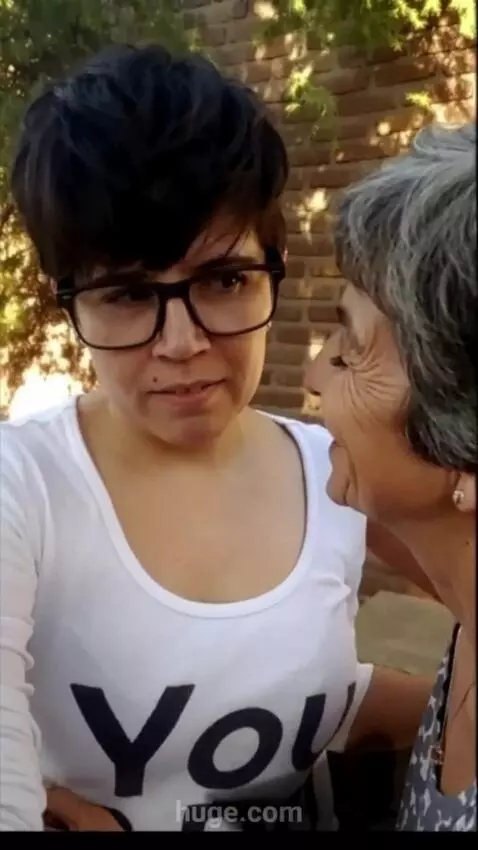 AI Video from prompt: A 60 year old husband hugs the women