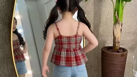 AI Video from prompt: Turn arouns slowly, then pose model