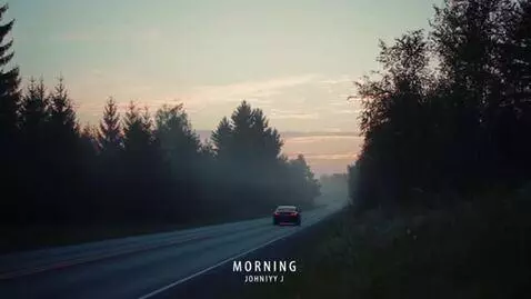 AI Video from prompt: The car in the distance slowly drives forward al