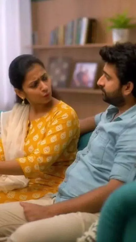 AI Video from prompt: Photorealistic Indian husband and wife sitting i