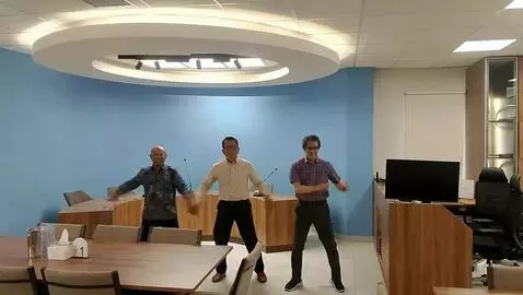 AI Video from prompt: three people are dancing happily