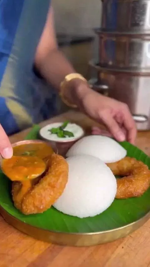 AI Video from prompt: She's an Indian girl cooking with the traditiona