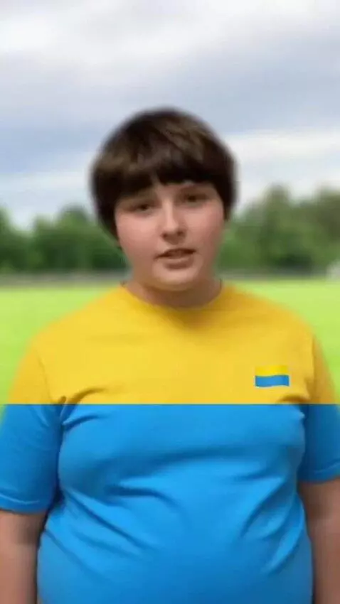 AI Video from prompt: Fat boy with yellow blue t-shirt Speaks "Guys, t