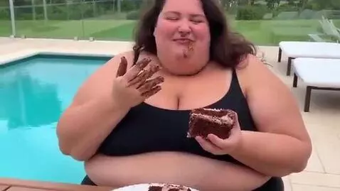 AI Video from prompt: Italian supermodel weighing 600 pounds in black 