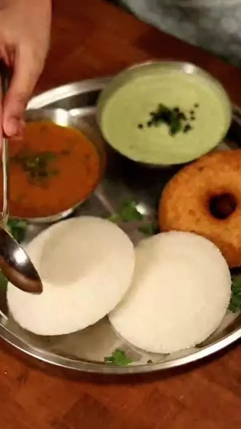 AI Video from prompt: She's an Indian girl cooking with the traditiona