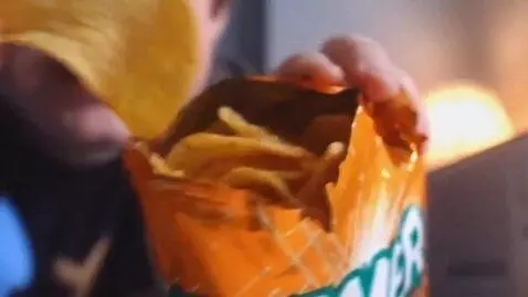 AI Video from prompt: talks: "eats zoomer chips" eats zoomer chips fat