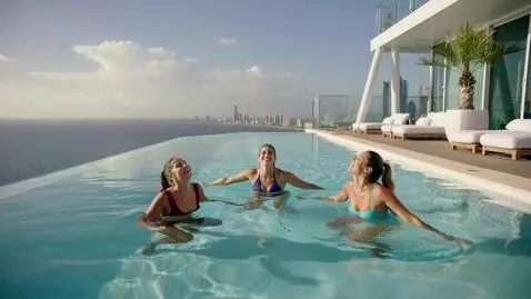 AI Video from prompt: European‑looking girls are hosting a pool party 