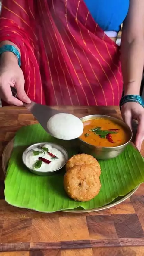 AI Video from prompt: She's an Indian girl cooking with the traditiona
