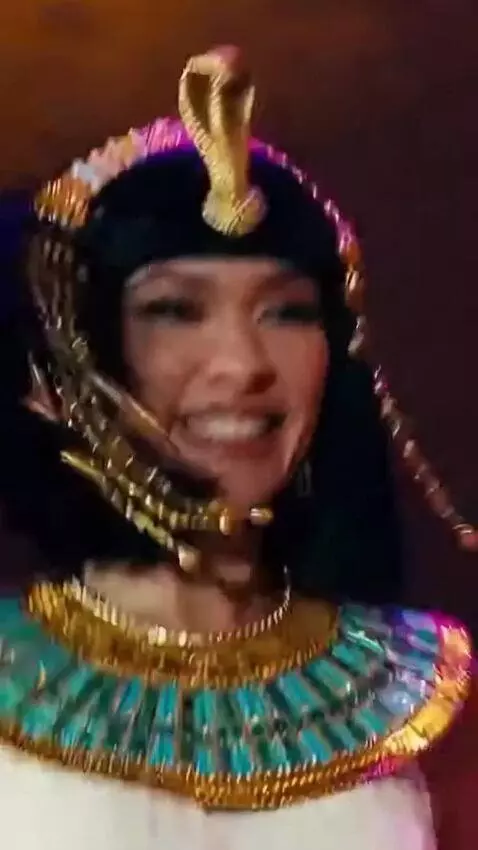 AI Video from prompt: Sandra, dressed as Cleopatra, is dancing the jiv
