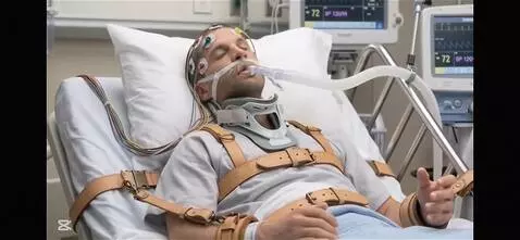 AI Video from prompt: Have the patients eyes roll to the back of his h