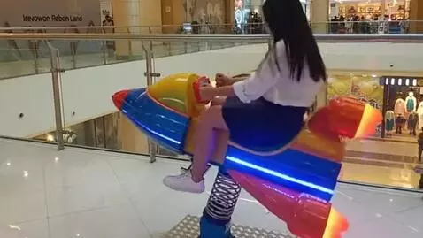 AI Video from prompt: rear side view of a hydraulic colorful rocket je