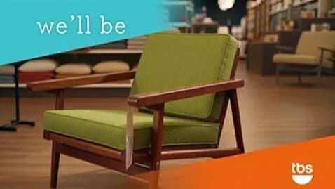 AI Video from prompt: A camera focuses on a chair in a store. Make it 
