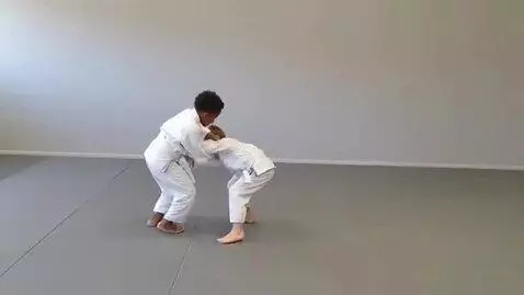 AI Video from prompt: two boys at six years,wearing bjj jackets,white 