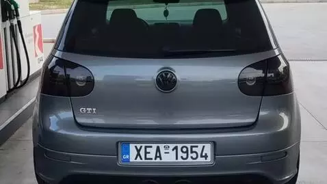AI Video from prompt: Make in this golf 5 gti downpipe sound pops turb