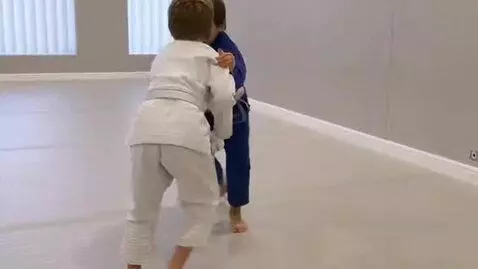 AI Video from prompt: two boys at six years,wearing bjj jackets,white 