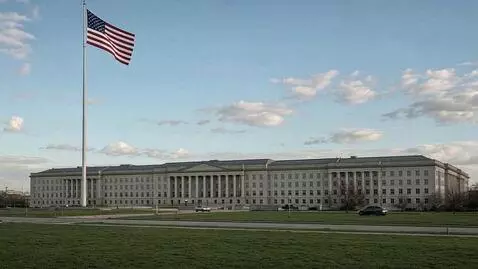 AI Video from prompt: Camera: locked wide, then 3° pan along the build