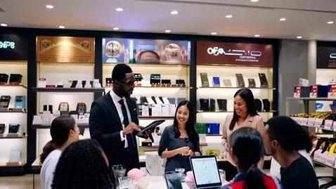 AI Video from prompt: A marketer advertising goods to customers