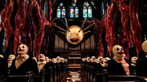 AI Video from prompt: A cathedral made of raw meat and pulsating veins
