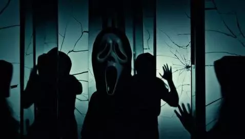 AI Video from prompt: A dark room lined with tall, cracked mirrors. In