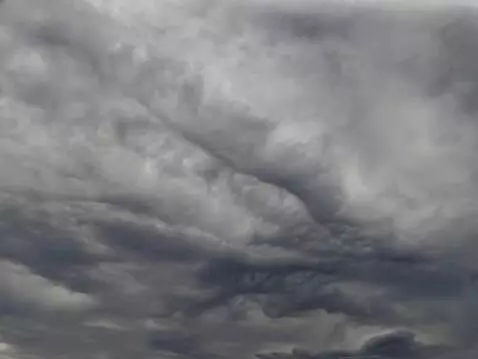 AI Video from prompt: A flight through the clouds and the planet Earth