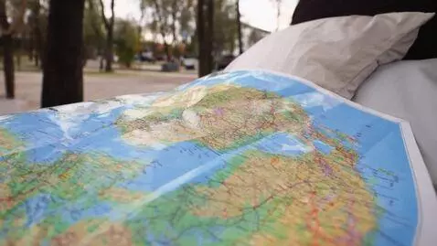 AI Video from prompt: The map on my lap vanished during my nap.