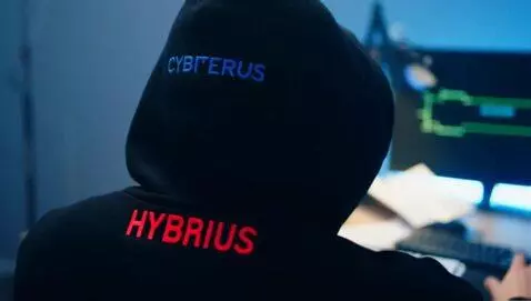 AI Video from prompt: A person wearing a black hoodie is working on a 