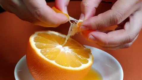 AI Video from prompt: Citrus Peeling & Segmenting (Orange/Grapefruit):