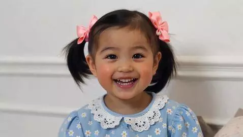AI Video from prompt: Cute girl laughing