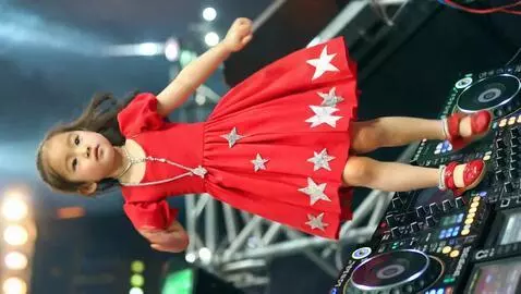 AI Video from prompt: Little girl dance on dj