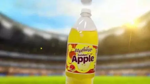 AI Video from prompt: Maduria Gold Apple Soda Commercial (Sponsored by