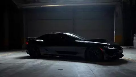 AI Video from prompt: Dark hangar studio, cool sports car presentation