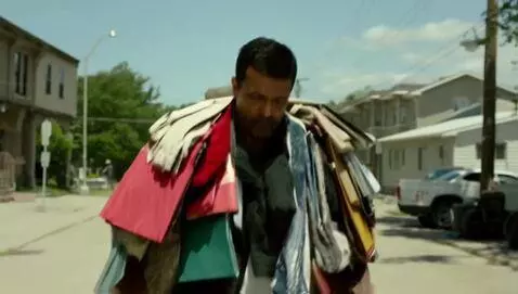 AI Video from prompt: a man is wearing the most clothes anyone has eve