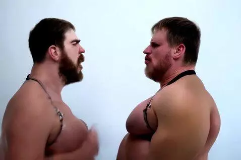 AI Video from prompt: two hot and busty goth twins angrily bumping the