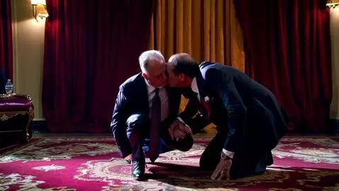AI Video from prompt: Trump down on one knee kisses the ring on Putin'