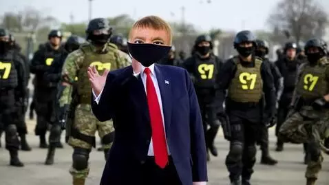 AI Video from prompt: Donald Trump in a Tactical outfit with a Anonymo