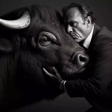 AI Video from prompt: man whispering to a huge bull