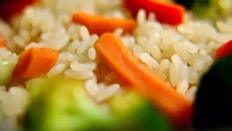 AI Video from prompt: Cooking vegetable with rice