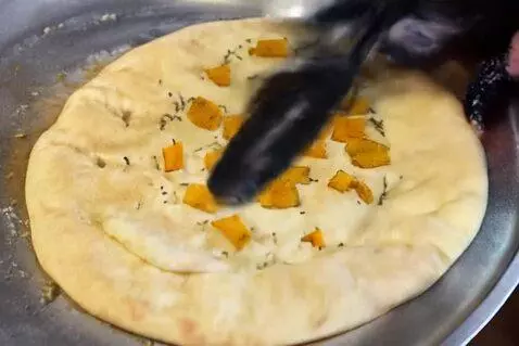 AI Video from prompt: Making aaloo paratha by Lil punjabi girl