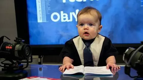 AI Video from prompt: Baby Reading news at a tv station