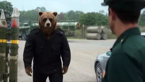 AI Video from prompt: A realistic brown bear dressed in a black baggy 